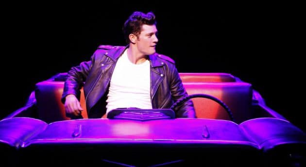 Rob Mills as Danny in GREASE. Image by Jeff Bubsy