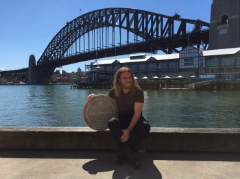 Tim Minchin with his commemorative plaque on Sydney's Theatre Walk, Walsh Bay